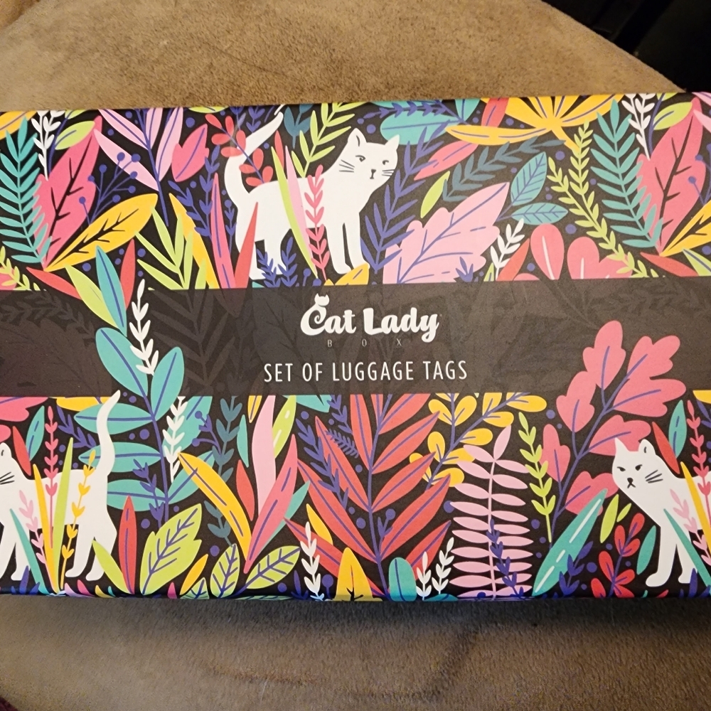 Set of luggage tags, never used, cat design